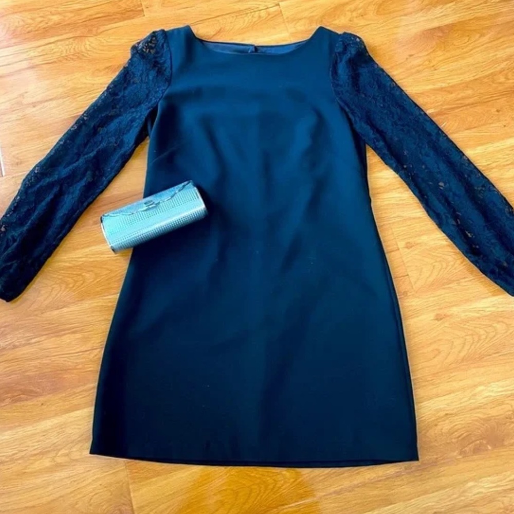 White House Black Market shift dress with lace sleeves.